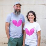 Happenstance Distillery - Mei-Lin and Tim outside with branded T-Shirts