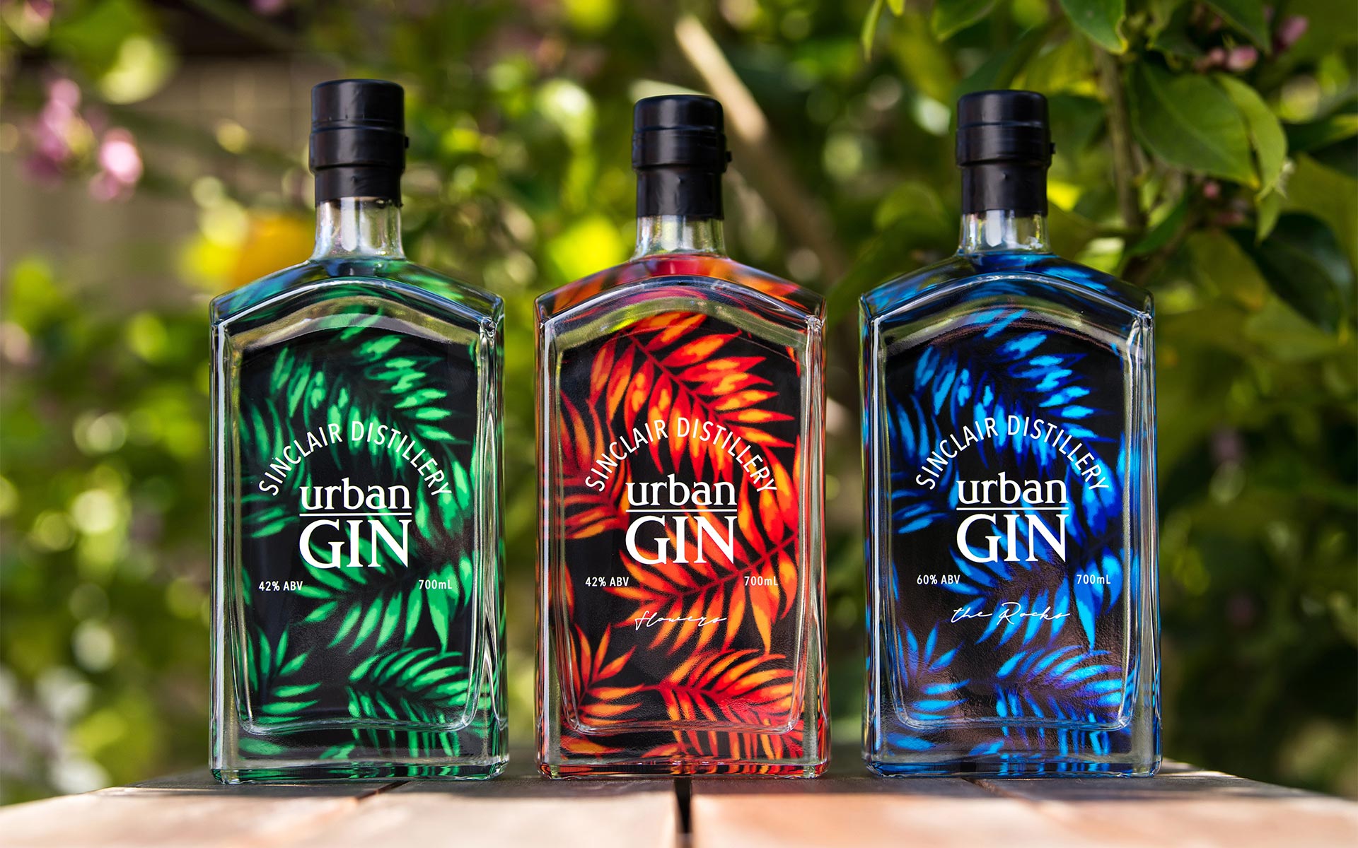 Urban Gin product range against a leafy background