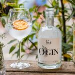 Kangaroo Island Spirits - Ogin bottle with drink served in a wine glass and garnishes