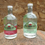 Flinders Gin - Signature Gins - Quandong and Farriers gins on a rock