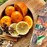 Woodwater – My Gin on a cutting board with various botanicals