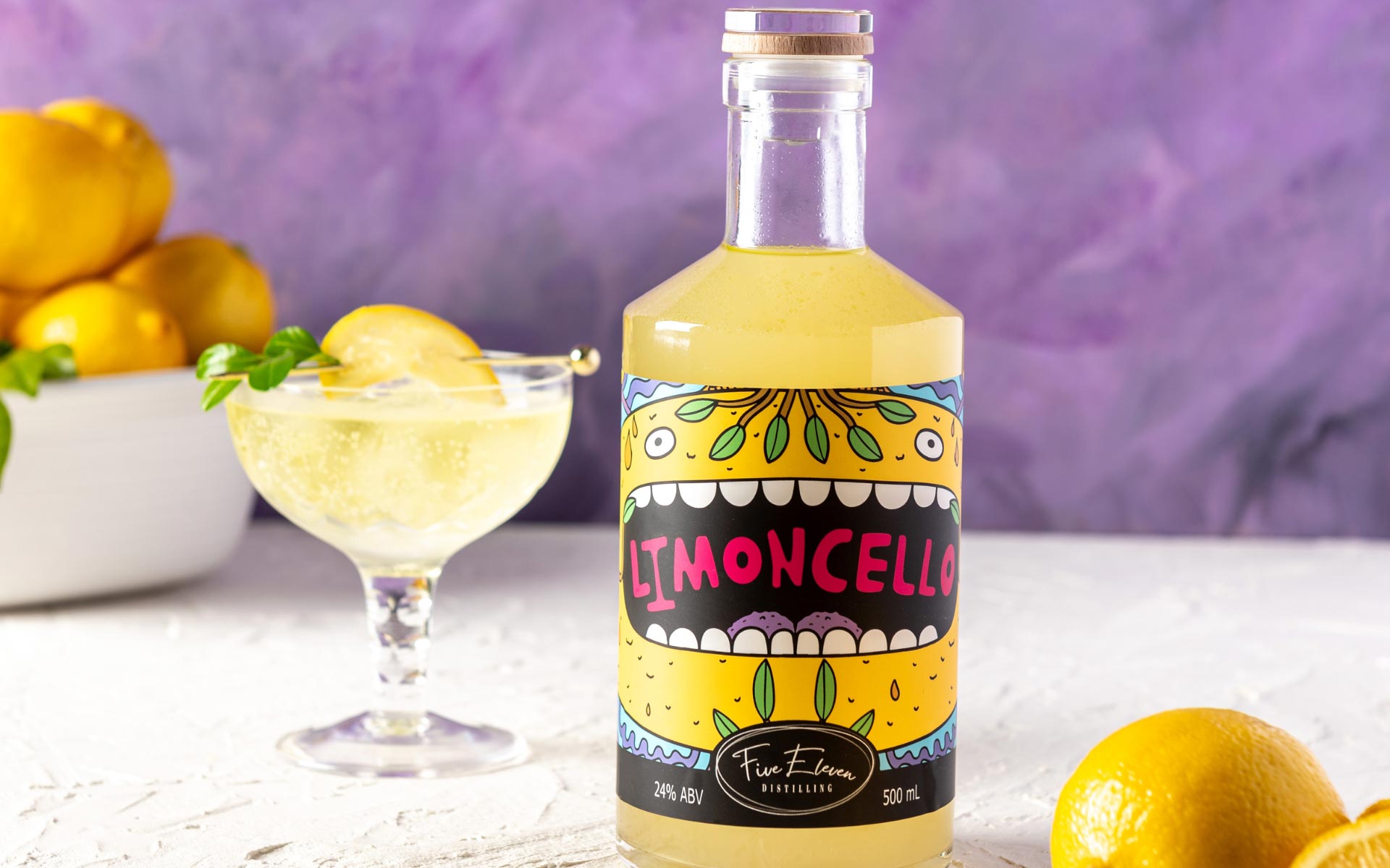 Five Eleven Distilling Limoncello with a glass and lemon