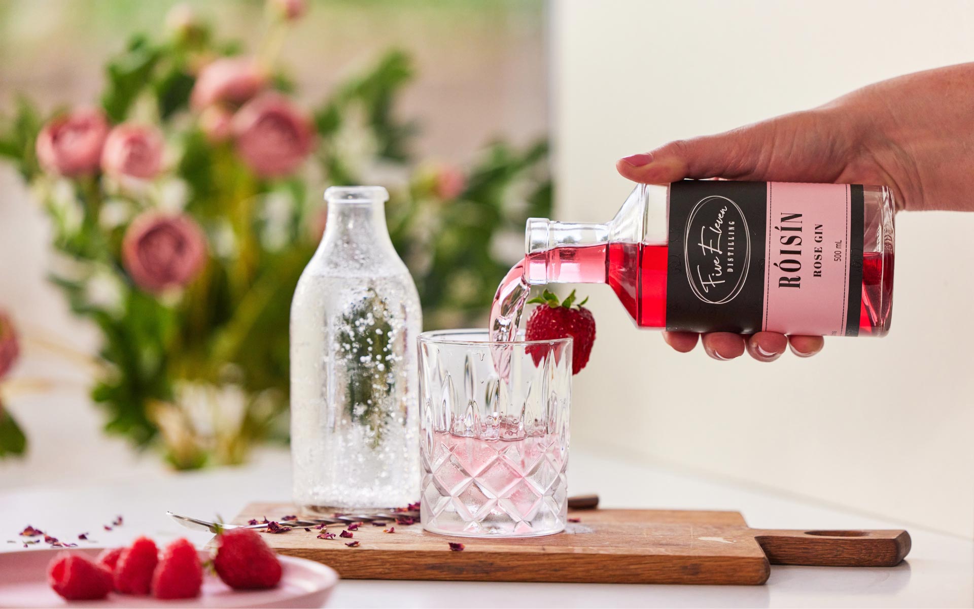 Five Eleven Distilling Rose Gin being poured into a glass